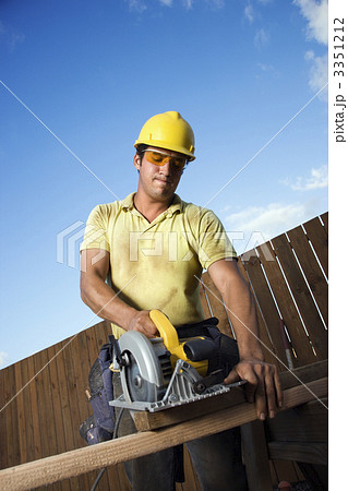 Construction Worker Cutting Wood 3351212