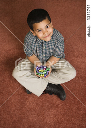 Boy holding Easter candy. 3351745