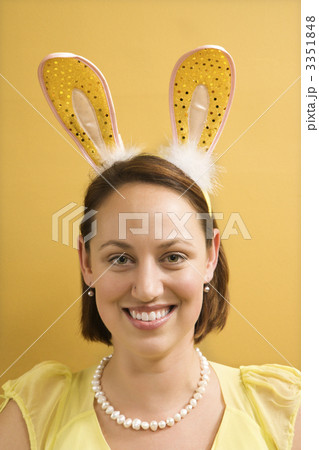 Woman wearing rabbit ears. 3351848