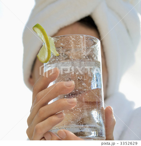 Woman holding drink. 3352629