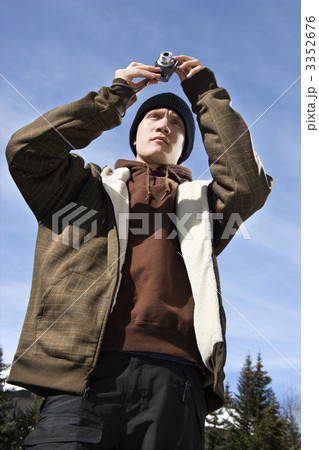Teen taking picture. 3352676