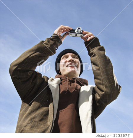 Teen taking picture. 3352677