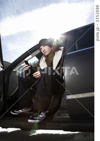 Teen sitting in car. 3352686