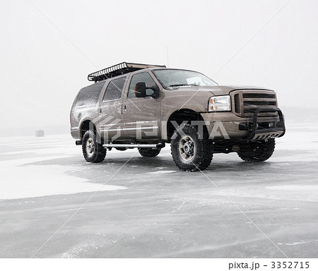 Truck on frozen lake. Truck on frozen lake. 3352715