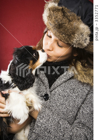 Woman kissing dog. Woman kissing dog. 3352771