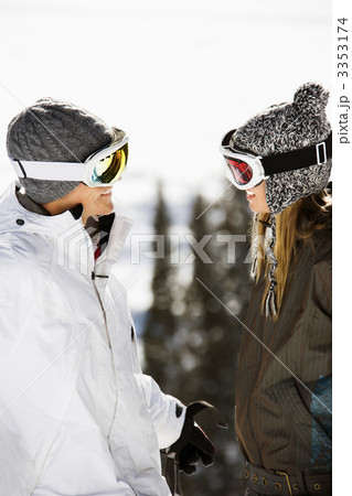 Two Skiers Smiling at Each Other Two Skiers Smiling at Each Other 3353174