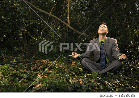 Businessman Sitting in Meditation Outside 3353638