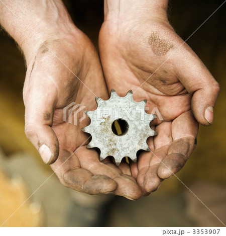 Metalsmith holding metal leaf. 3353907
