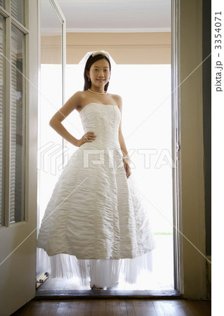 Bride standing in doorway. Bride standing in doorway. 3354071