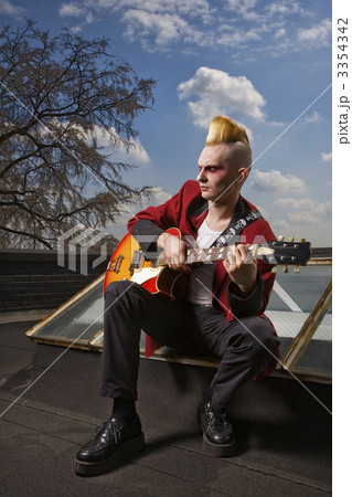 Punk playing guitar. 3354342