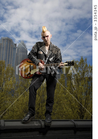 Punk playing guitar. 3354345