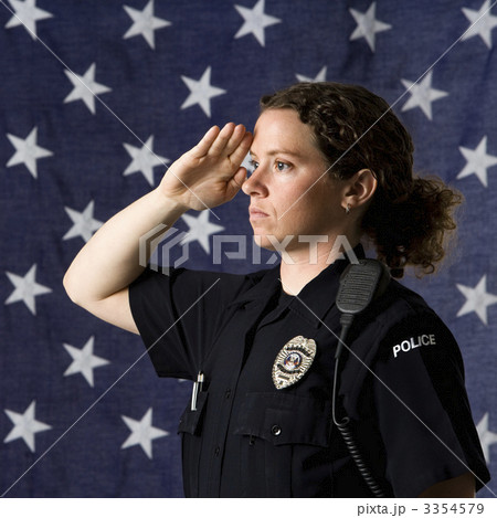 Policewoman saluting. Policewoman saluting. 3354579