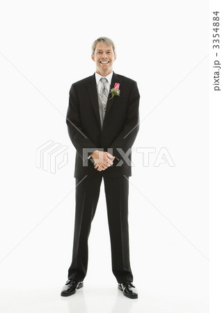Groom in tuxedo. 3354884