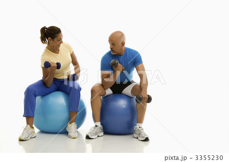 Man and woman exercising. 3355230