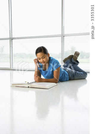 Girl doing homework. Girl doing homework. 3355301