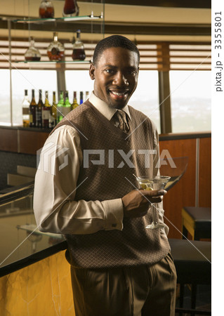 Man drinking martini. 3355801