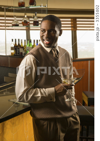 Man drinking martini. 3355802