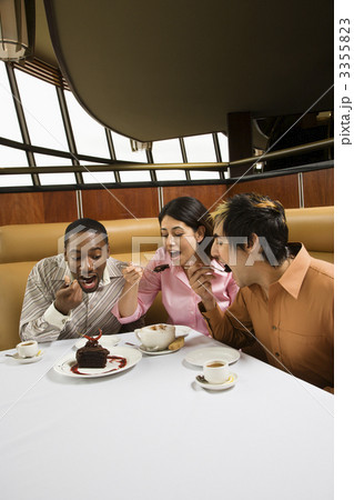 Friends eating dessert. 3355823