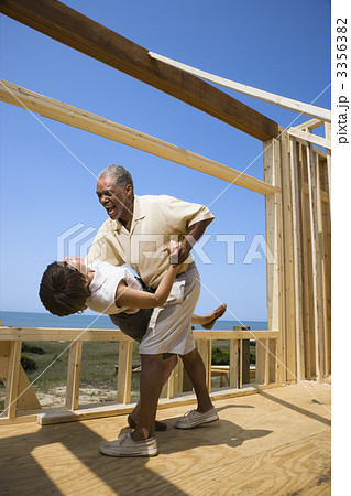 Happy couple at new home site. Happy couple at new home site. 3356382