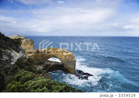 Rock arch in ocean. 3359529