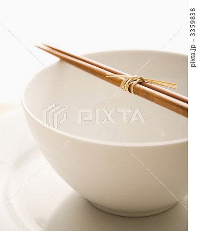 Chopsticks on an Empty Bowl. Isolated 3359838