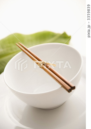 Chopsticks on an Empty Bowl. Isolated 3359839
