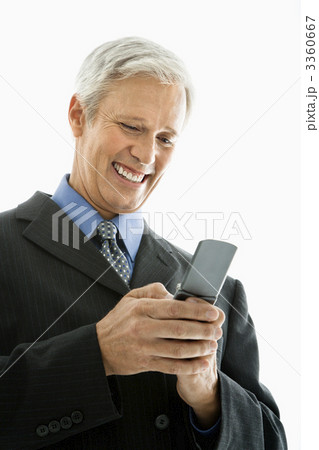 Businessman text messaging. 3360667