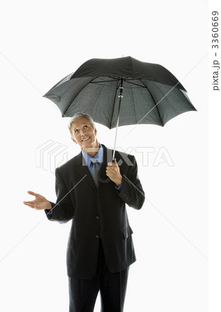 Man holding umbrella. 3360669