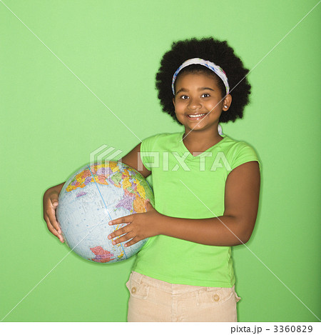 Girl holding globe. 3360829