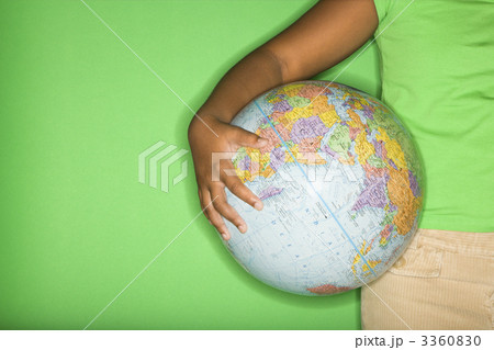 Girl holding globe. 3360830