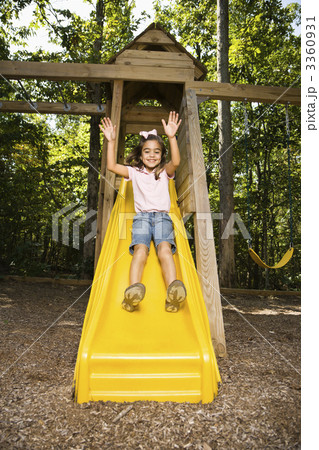 Happy girl sliding. 3360931