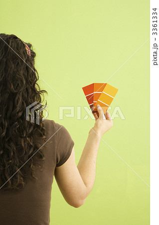 Woman with paint swatches. Woman with paint swatches. 3361334