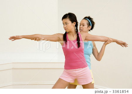 Fitness instructor and student Fitness instructor and student 3361854