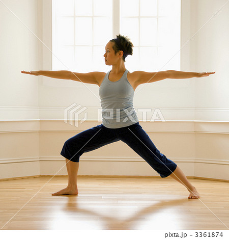 Woman in warrior pose 3361874