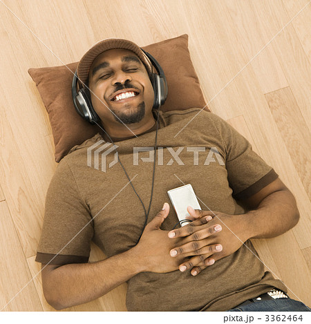 Man relaxing to music. Man relaxing to music. 3362464
