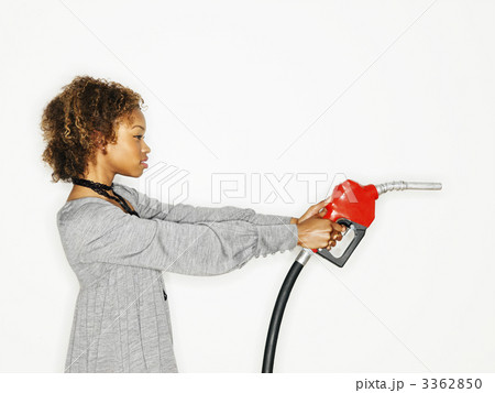 Woman holding gas gun Woman holding gas gun 3362850