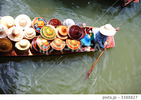 Vendor on floating market in Thailand 3388827
