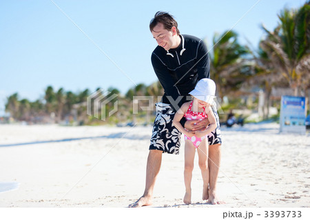 Father and daughter at beach 3393733