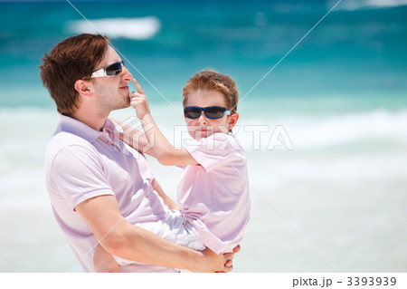Father and son at beach 3393939