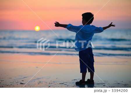 Little boy at sunset Little boy at sunset 3394200
