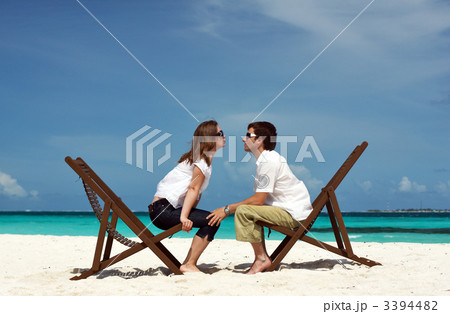 Young couple on the beach Young couple on the beach 3394482