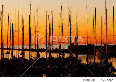 yachts at sunset yachts at sunset 3427592