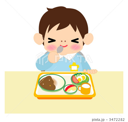 給食を食べる男の子のイラスト素材
