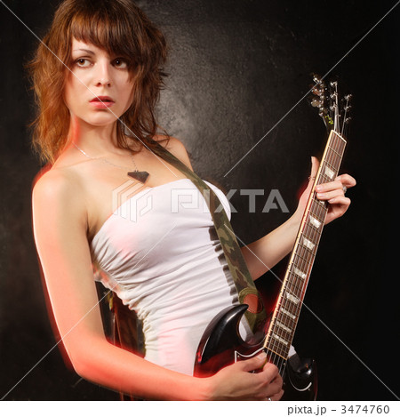 Gorgeous female guitar player Gorgeous female guitar player 3474760