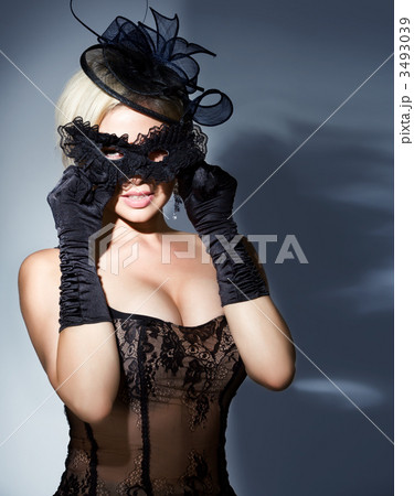 blonde with carnival mask 3493039