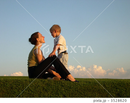 mother with son on sundown mother with son on sundown 3528620
