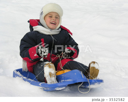 child on sled child on sled 3532582