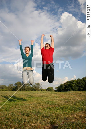 jump couple on meadow jump couple on meadow 3533052