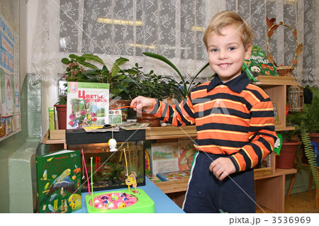 child in kindergarten fishing child in kindergarten fishing 3536969