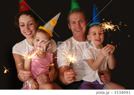 family of four with sparklers family of four with sparklers 3538091